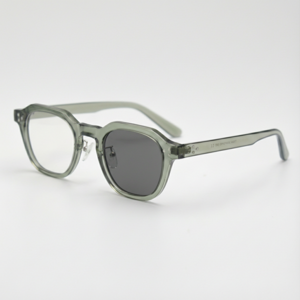 April Grey Photochromic Lens Glasses - Transparent green Geometric TR90 Frame