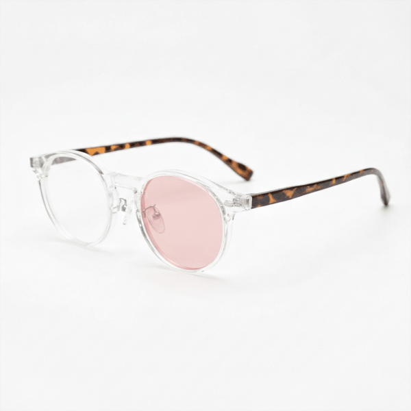Erin Pink Photochromic Lens Glasses - Clear Round TR90 Frame - Side View Erin Pink Photochromic Lens Glasses - Clear Round TR90 Frame