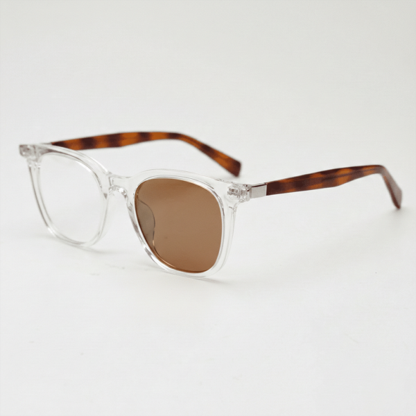 Faith Brown Photochromic Lens Glasses - Clear Rectangle TR90 Frame - Side View Faith Brown Photochromic Lens Glasses - Clear Rectangle TR90 Frame