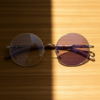 Jo Purple Photochromic Lens Glasses - Gold Round Metal Frame - Lifestyle Jo Purple Photochromic Lens Glasses - Gold Round Metal Frame