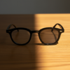 Joyce Grey Photochromic Lens Glasses - Black Oval TR90 Frame - Lifestyle Joyce Grey Photochromic Lens Glasses - Black Oval TR90 Frame