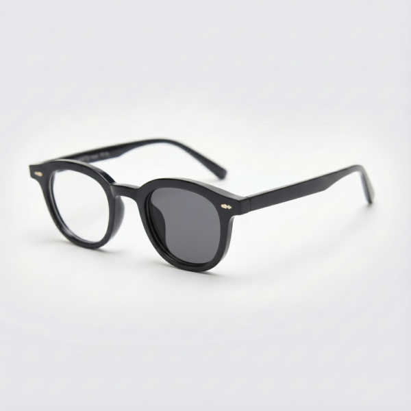 Joyce Grey Photochromic Lens Glasses - Black Oval TR90 Frame - Side View Joyce Grey Photochromic Lens Glasses - Black Oval TR90 Frame