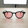 Joyce Pink Photochromic Lens Glasses - Black Oval TR90 Frame - Lifestyle Joyce Pink Photochromic Lens Glasses - Black Oval TR90 Frame