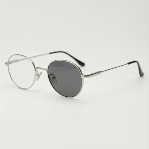 June Grey Photochromic Lens Glasses - Silver Round Stainless steel Frame - Side View June Grey Photochromic Lens Glasses - Silver Round Stainless steel Frame