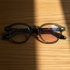 Lena Pink Photochromic Lens Glasses - Olive green Round TR90 Frame - Lifestyle Lena Pink Photochromic Lens Glasses - Olive green Round TR90 Frame