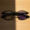 Lena Purple Photochromic Lens Glasses - Olive green Round TR90 Frame - Lifestyle Lena Purple Photochromic Lens Glasses - Olive green Round TR90 Frame