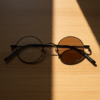 LVY Brown Photochromic Lens Glasses - Matte black Round Titanium Frame - Lifestyle LVY Brown Photochromic Lens Glasses - Matte black Round Titanium Frame