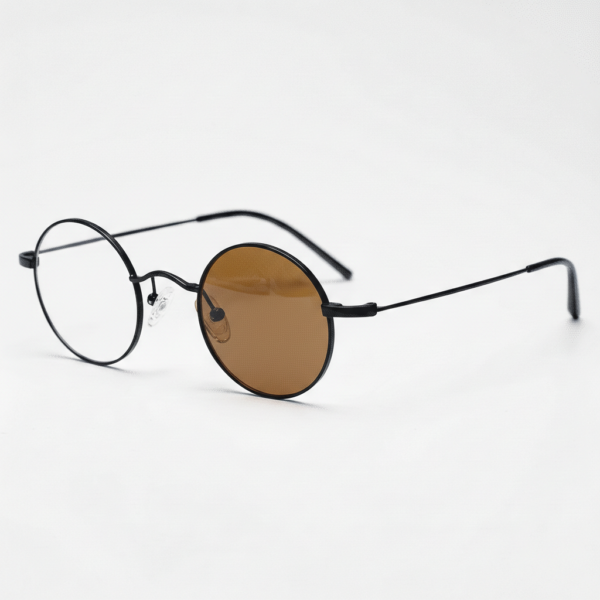 LVY Brown Photochromic Lens Glasses - Matte black Round Titanium Frame - Side View LVY Brown Photochromic Lens Glasses - Matte black Round Titanium Frame