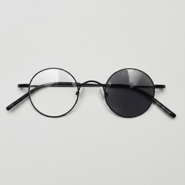 LVY Grey Photochromic Lens Glasses - Matte black Round Titanium Frame - Front View LVY Grey Photochromic Lens Glasses - Matte black Round Titanium Frame