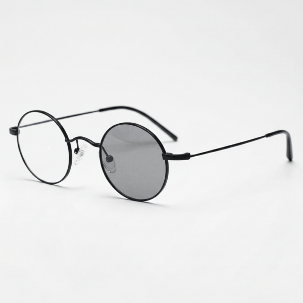 LVY Grey Photochromic Lens Glasses - Matte black Round Titanium Frame - Side View LVY Grey Photochromic Lens Glasses - Matte black Round Titanium Frame