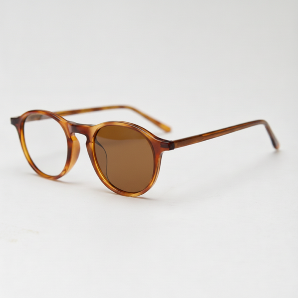 Moira Brown Photochromic Lens Glasses - Tortoise Round TR90 Frame - Side View Moira Brown Photochromic Lens Glasses - Tortoise Round TR90 Frame