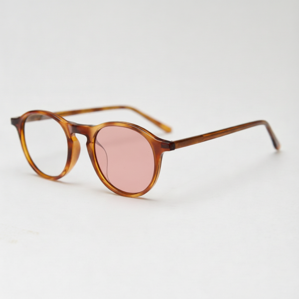 Moira Pink Photochromic Lens Glasses - Tortoise Round TR90 Frame - Side View Moira Pink Photochromic Lens Glasses - Tortoise Round TR90 Frame