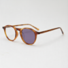 Moira Purple Photochromic Lens Glasses - Tortoise Round TR90 Frame - Side View Moira Purple Photochromic Lens Glasses - Tortoise Round TR90 Frame