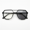 Poppy Grey Photochromic Lens Glasses - Glossy black Geometric TR90 Frame - Front View Poppy Grey Photochromic Lens Glasses - Glossy black Geometric TR90 Frame